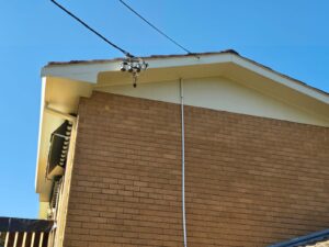 Professional plumber installing new pipes in Canberra home bathroom renovation project